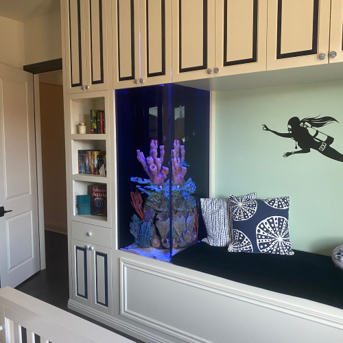 Vertical aquarium integrated into residential cabinetry